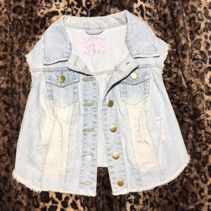 Size S/M- UK size 10. Vintage Denim Vest with rips